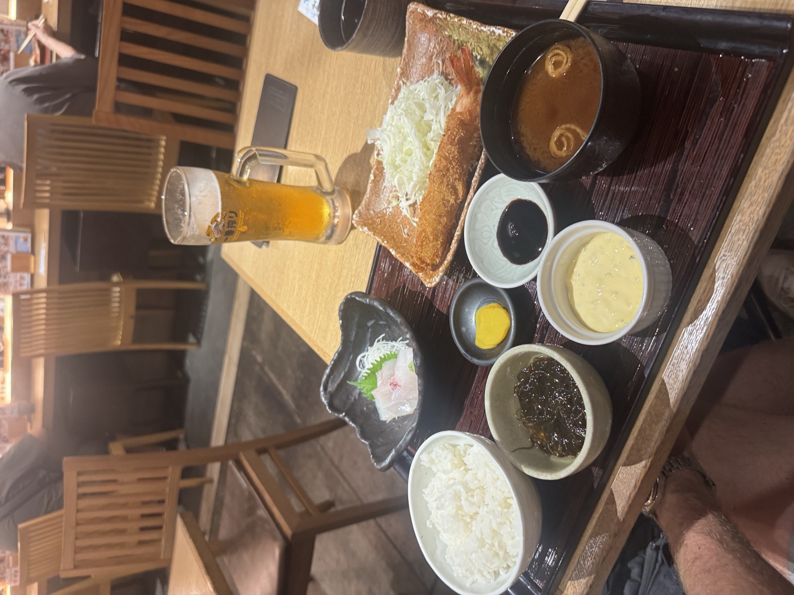 A classic izakaya set with beer, rice and fried fish.